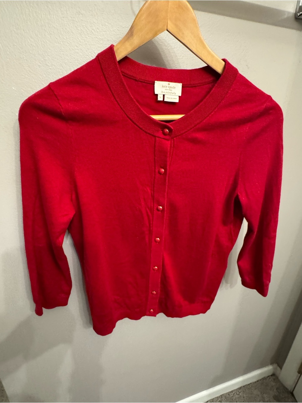 kate spade red knit top with label detail
